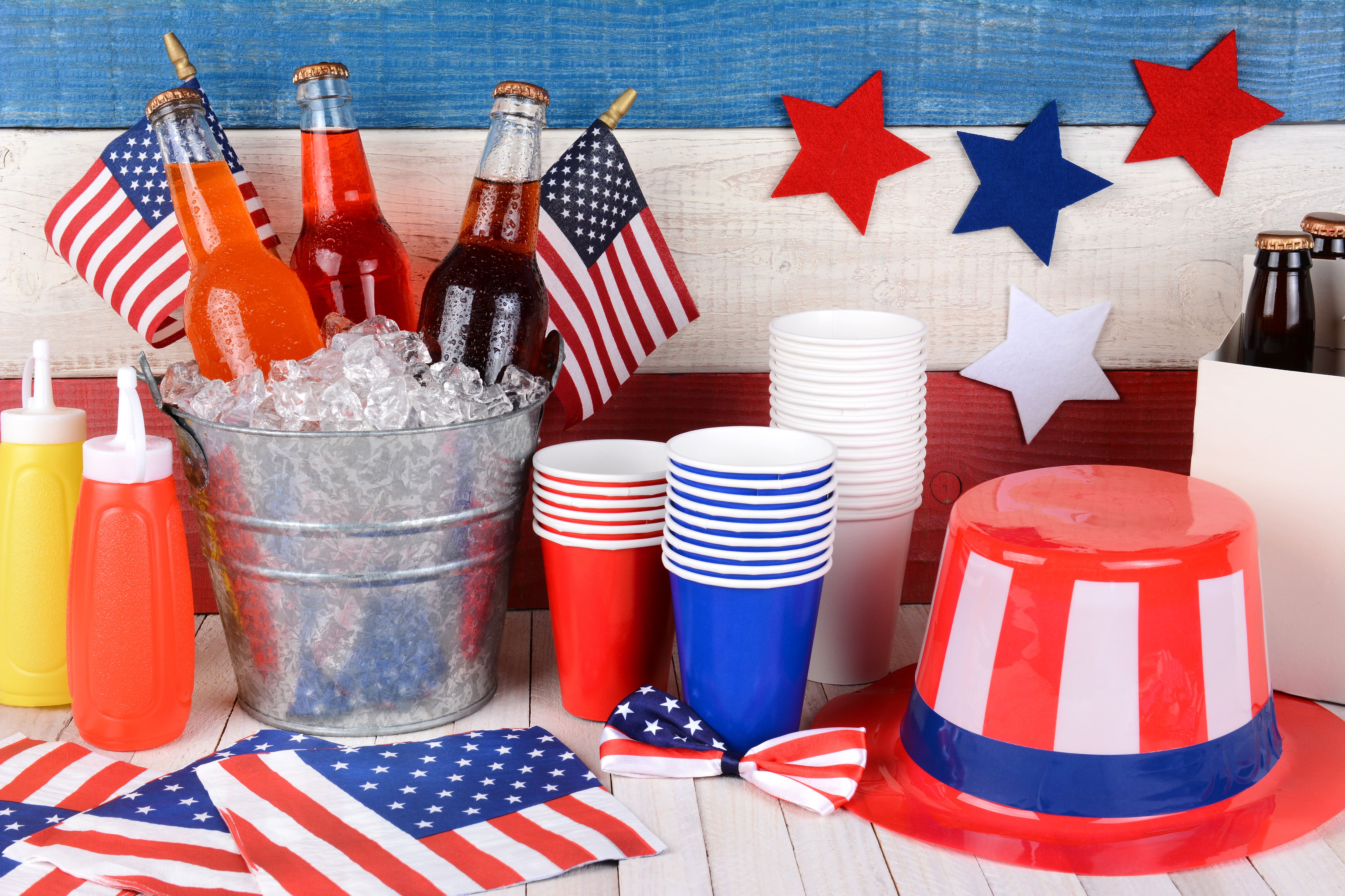 july fourth party spread of cups and sodas